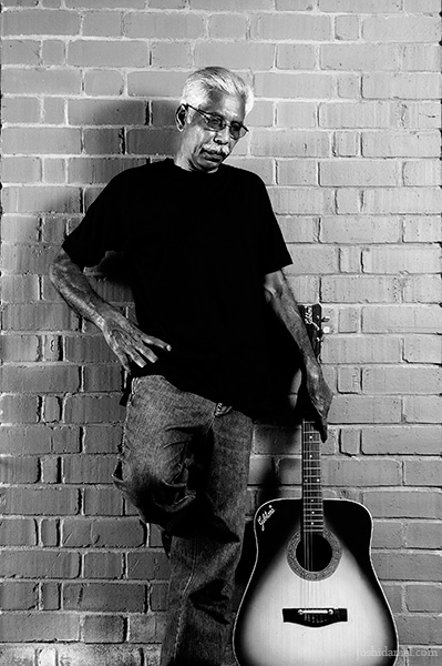 Portrait Black and white portrait of an old man with guitar