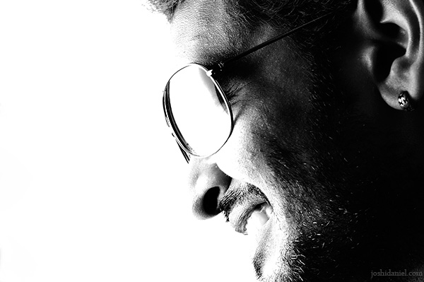 High-key portrait of male model Ajay J Nair smiling