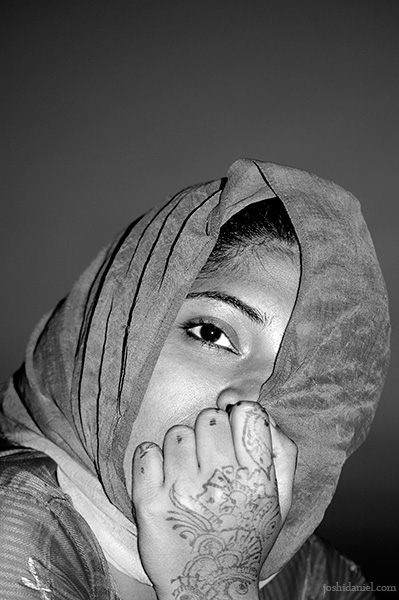 Portrait of a girl with mehndi on her hands