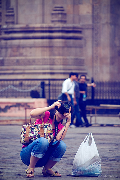 It's all about the perspective A lady takes photographs in front of Gateway of India in Mumbai