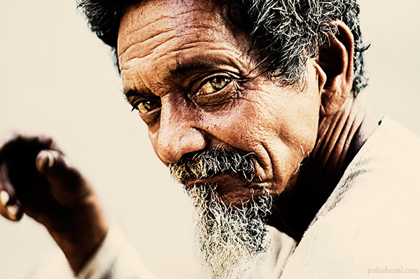 Captivating eyes of a banana seller from the streets of Mumbai, India