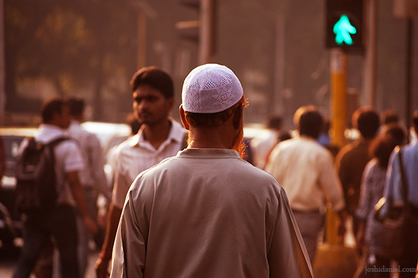 People crossing road and going to different destinations in Churchgate, Mumbai, India