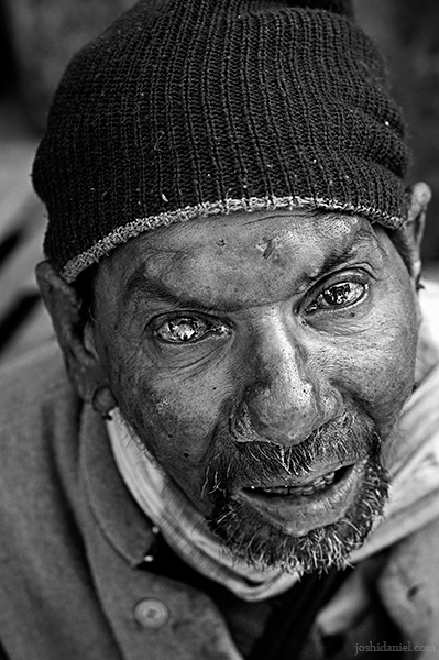 Black and white portrait of a man from the streets of Haridwar, India
