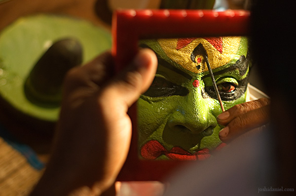 Reflection of kathakali artist kalamandalam Ratheesan doing make-up
