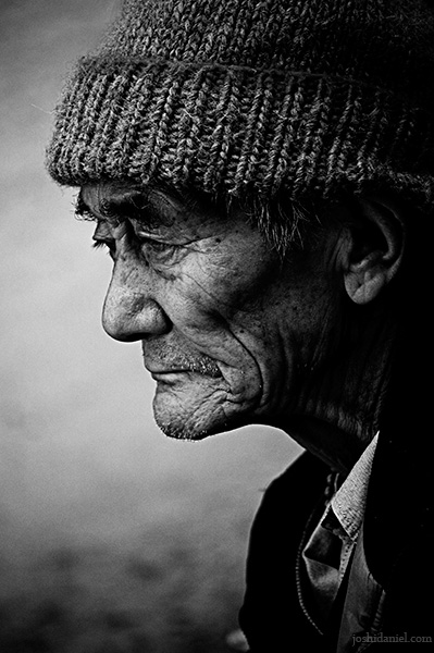 Pensive black and white portrait of an old man form Mcleod Ganj