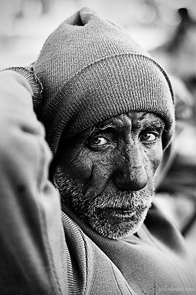 Black and white portrait of a rickshaw wallah from Jaipur, Rajasthan