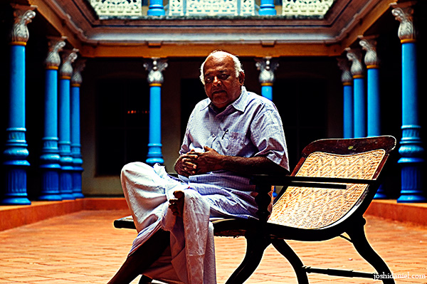 Chandramodi Chettiar sitting at the courtyard of his Chettinadu Manision