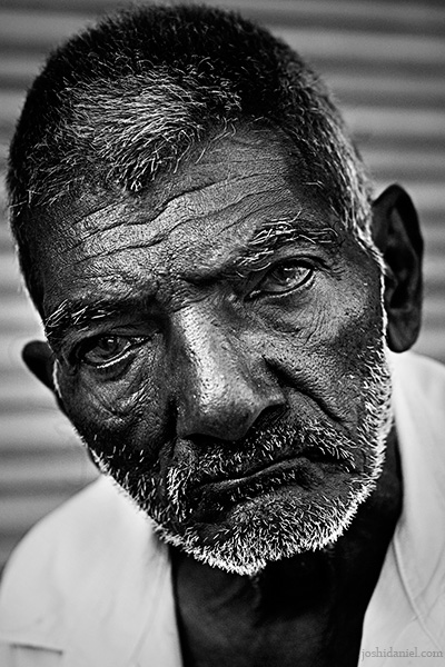 Black and white portrait of an old man from Chala market, Trivandrum