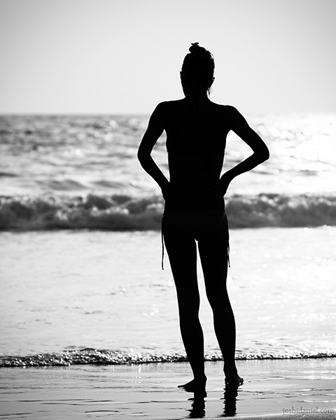 Silhouette of a tourist girl from Kovalam beach in Kerala