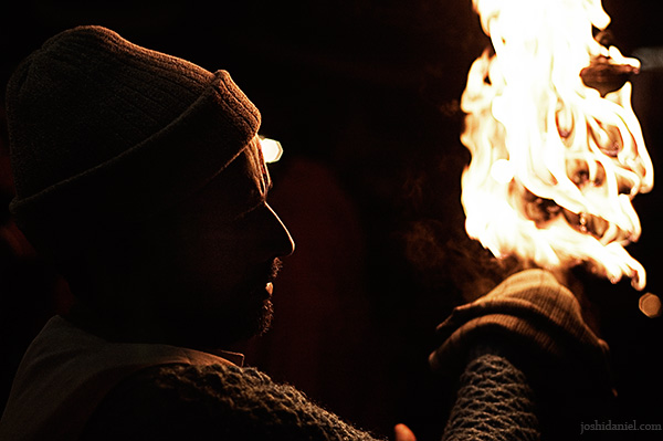 A priest holds a large fire bowl in his hand during an aarti at har ki pauri in Haridwar