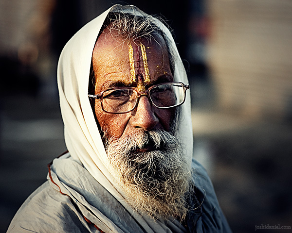 Portrait of a bearded man with spectacles from Maha Kumbh Mela in Allahabad (Prayag)