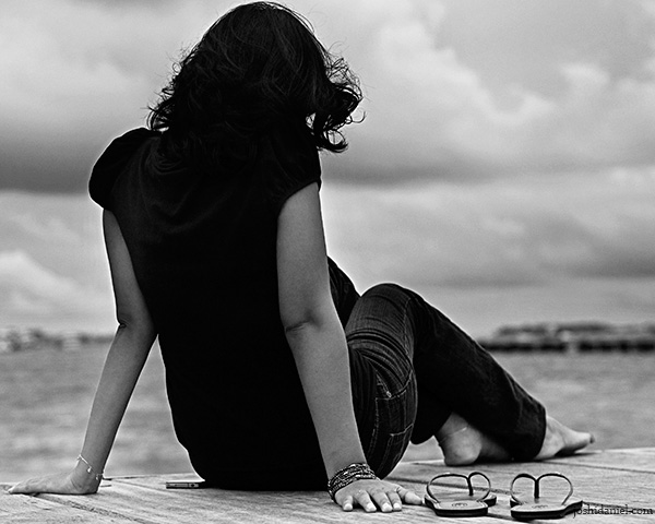 In a reverie Azhath Rushdy sitting and enjoying the view in Hulhumalé, Maldives