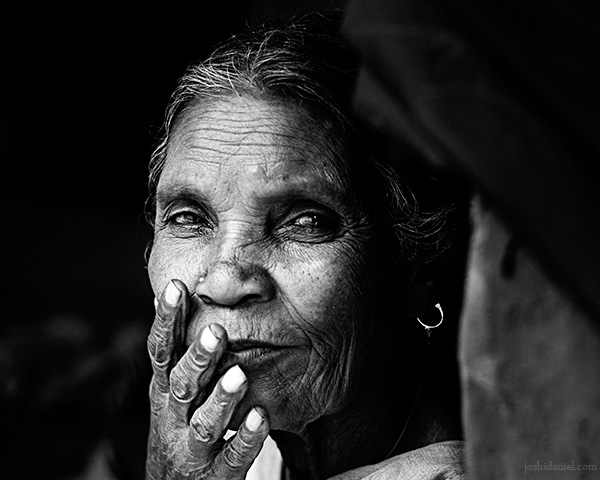 Black and white portrait of a tribal woman from Wayanad
