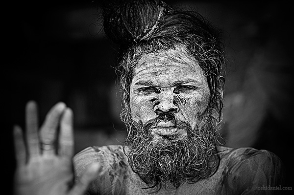 Black and white portrait of a naga sadhu from Varanasi, India