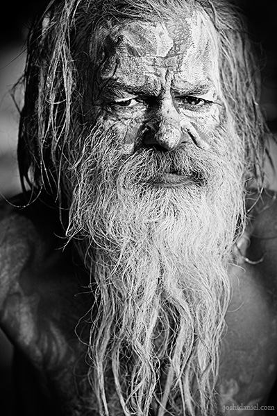 Black and white portrait of a menacing naga sadhu from Varanasi, India