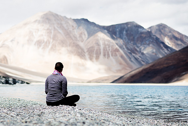 Photograph of Pauline sitting by the Pangong lake in Ladakh, Jammu and   Kashmir