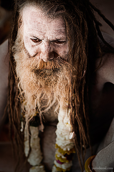 Portrait of a dark-eyed naga sadhu from Varanasi, India
