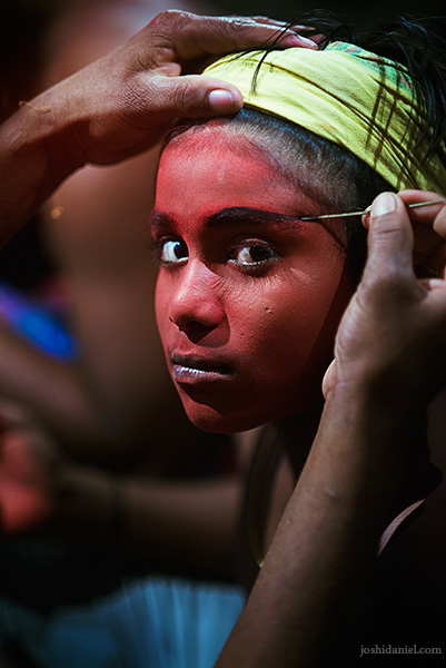 A young Kattai kooth performer during his make-up session at the Mylapore festival in Chennai