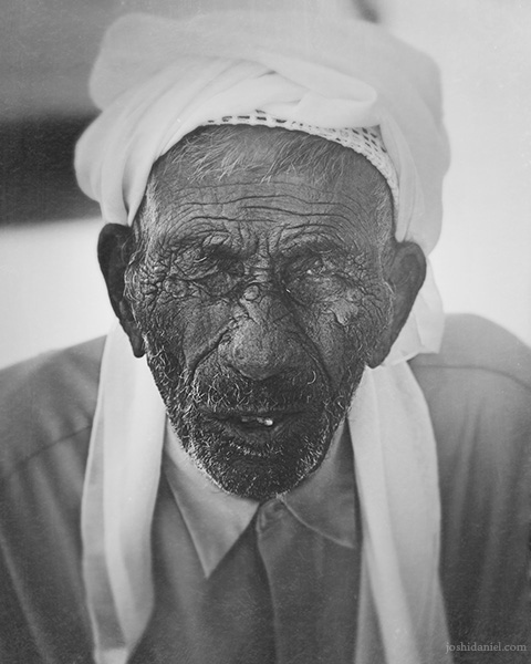 Black and white portrait of an old man in Sharjah, United Arab Emirates