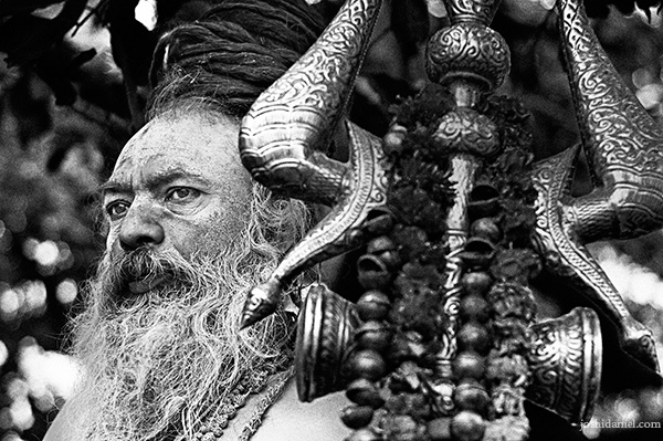 Black and white portrait of a naga sadhu with trishula at the Kumbh Mela 2010 in Haridwar