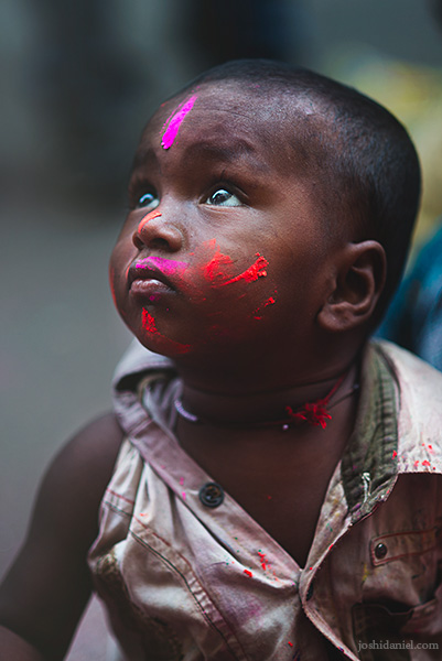 Portrait of a little boy during the festival of Holi in Sowcarpet, Chennai