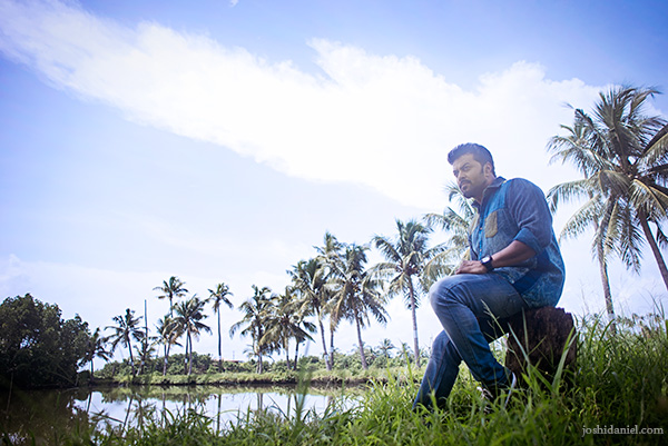 Malayalam film actor Indrajith Sukumaran sitting in a coconut grove in Ernakulam, Kerala