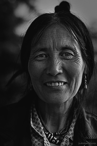Black and white portrait of a street vendor lady in McLeod Ganj, Dharamsala