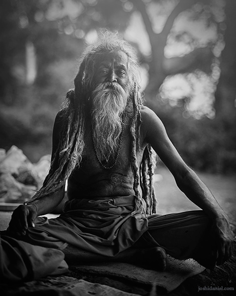 Black and white portrait of a sadhu at the Kumbh Mela in Trimbakeshwar