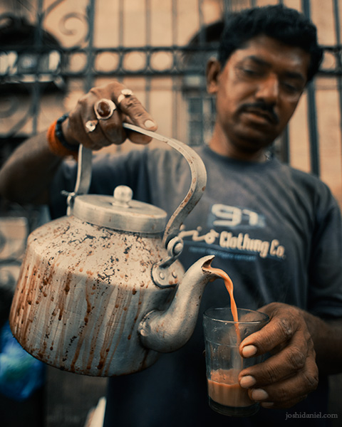 Cutting Chai A roadside tea seller in Mumbai serving cutting chai from a kettle
