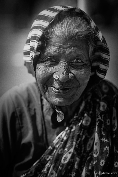 Black and white portrait of a smiling old lady in Chennai, India