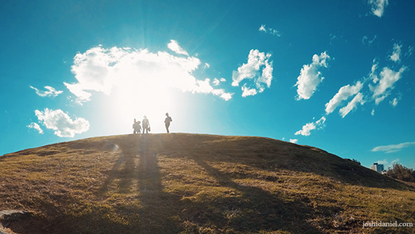 A GoPro image of people standing on top of the Bondi coastal walk cliff in Sydney, Australia