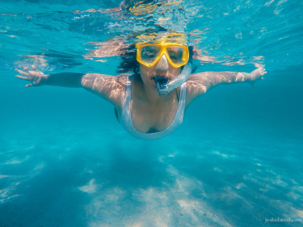Bressiona Chastity snorkelling at Pink beach, Indonesia