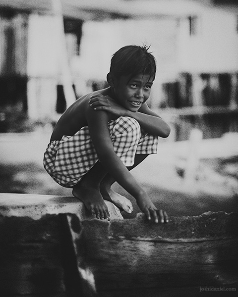 Black and white portrait of a boy from Senggarang Village, Indonesia