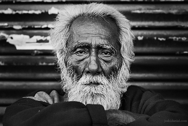 Black and white portrait of an old bearded man in Allahabad, Uttar Pradesh, India