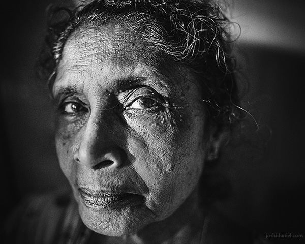 Black and white portrait of my mother taken using a 28mm wide angle lens