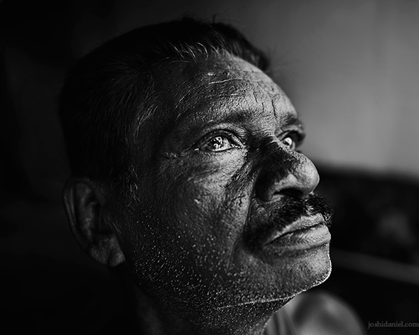 Looking up A 28mm wide angle black and white portrait of a man looking up