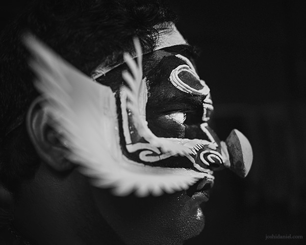 A 28mm wide angle black and white portrait of a Kathakali artist in Trivandrum, Kerala, India