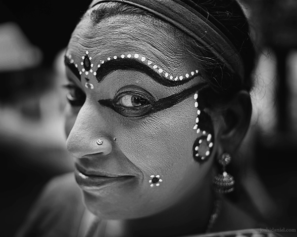 A 28mm wide angle black and white portrait of Nangiarkoothu artist Margi Usha.