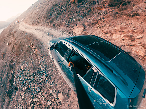 A GoPro photograph of joshi daniel through the window of a Skoda Kodiaq en route Chandratal, Spiti Valley, Himachal Pradesh, India
