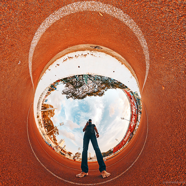 An inverted little planet (tiny planet) self-portrait of joshi daniel taken with a GoPro Fusion 360 degree camera in Chandrashekaran Nair Stadium, Trivandrum, Kerala, India