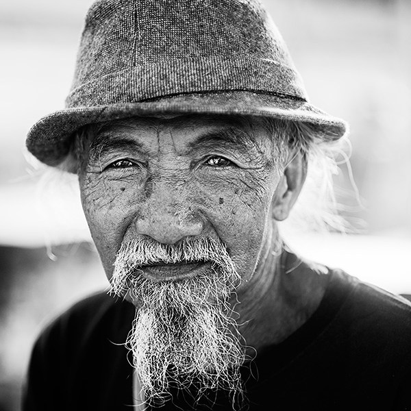 Portrait of a bearded old man in Uluwatu, Bali, Indonesia