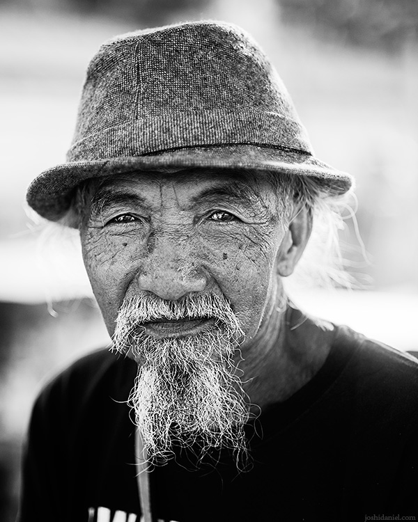 Portrait of a bearded old man in Uluwatu, Bali, Indonesia