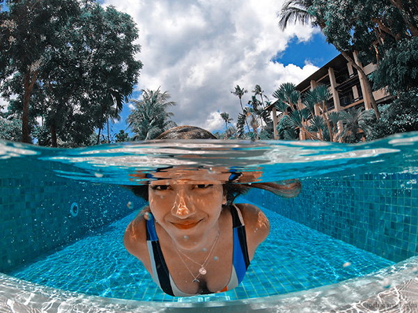 A GoPro HERO7 Black over/under photo of Larissa Dsa in the swimming pool in Koh Samui, Thailand