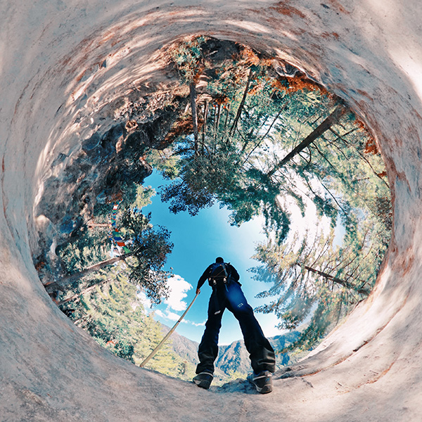 Inverted little planet (tiny planet) self-portrait of joshi daniel during the trek to Tiger's Nest (Paro Taktsang), Paro Valley, Paro District, Bhutan